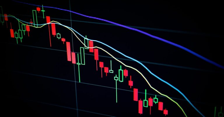 Stock market charts and graphs representing index fund investing