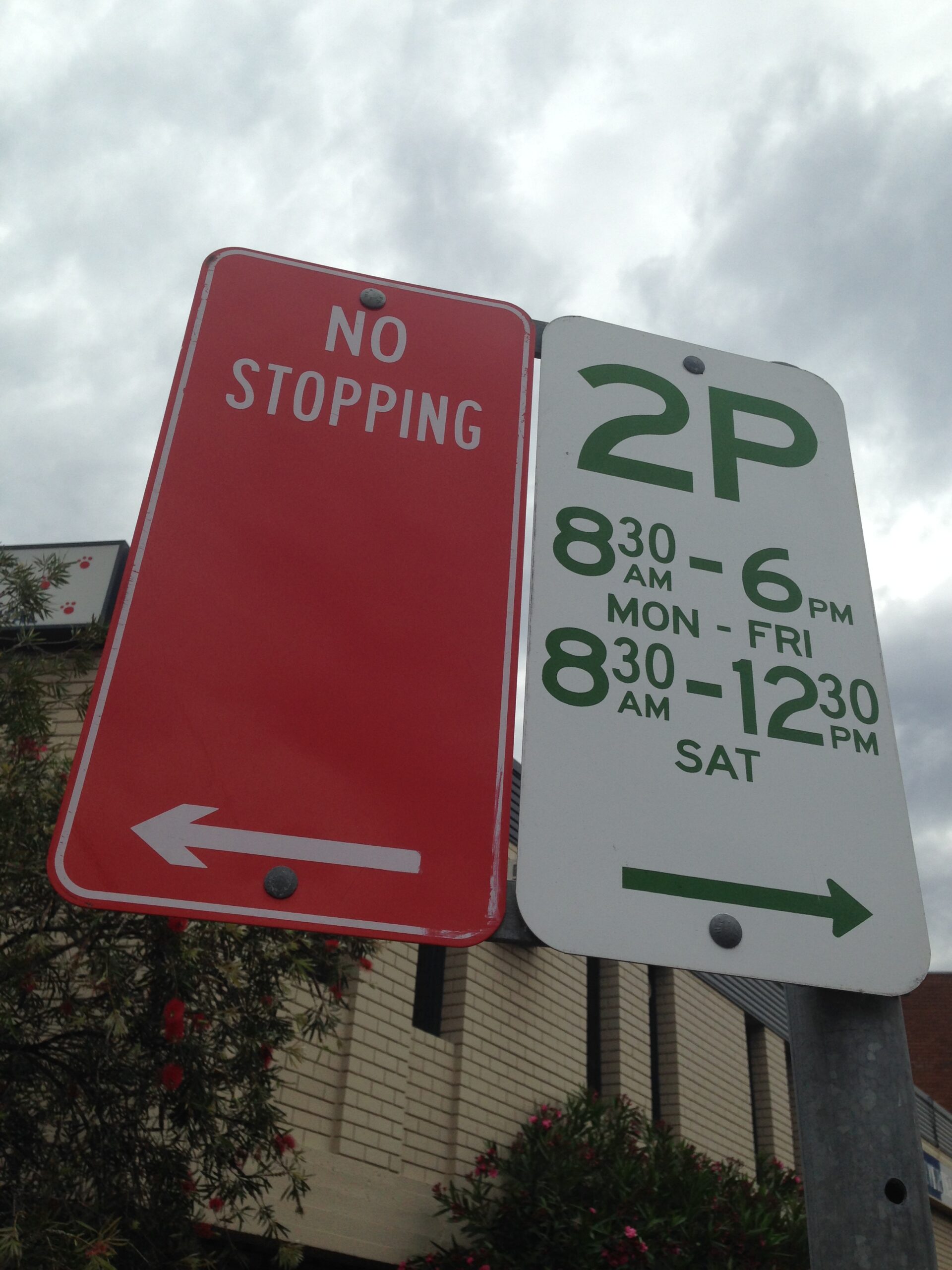 Parking restriction sign with multiple conditional time rules, similar to the sign that led to this parking fine