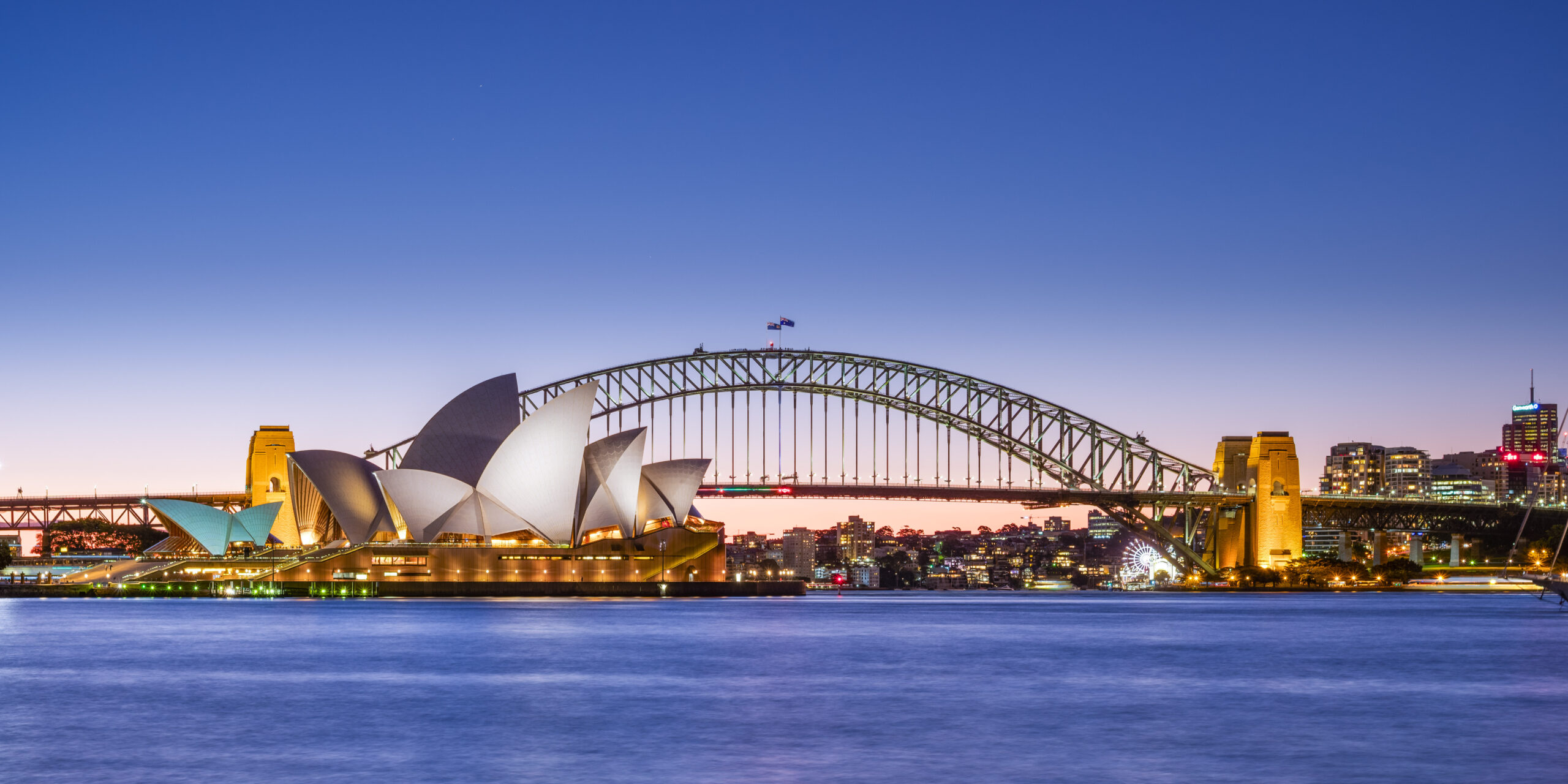 Sydney Opera House and Harbour Bridge at dusk, the most expensive city in this Sydney vs Lisbon vs Chiang Mai cost-of-living comparison